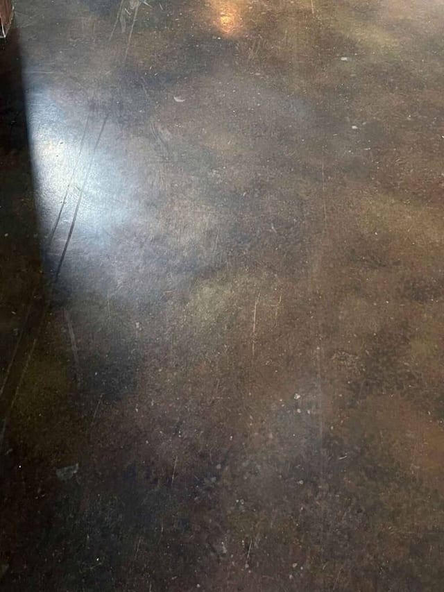 A heavily scratched ‘stained and sealed’ concrete floor. These scratches required repairs to the entire home to resolve. A heavily scratched ‘stained and sealed’ concrete floor. These scratches required repairs to the entire home to resolve.
