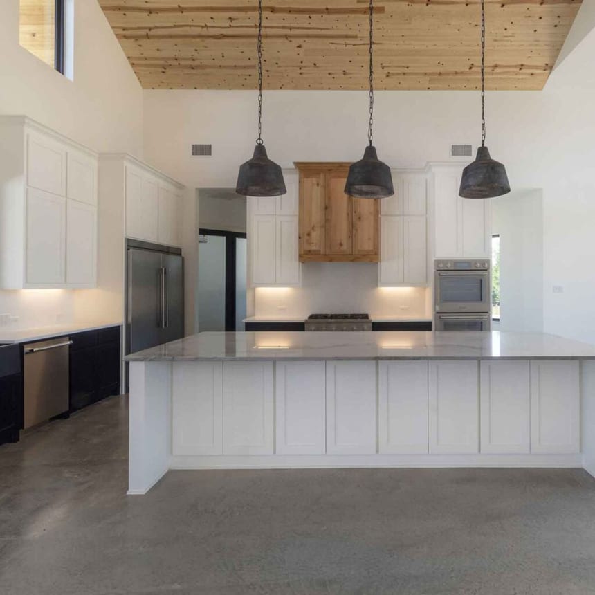 A Modern Kitchen With Polished Concrete Floors in Fort Worth, Texas. A Modern Kitchen With Polished Concrete Floors in Fort Worth, Texas.