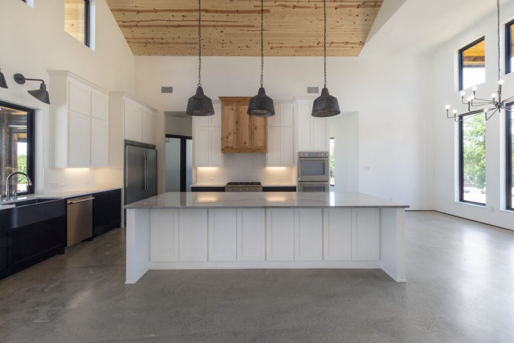 Satin, Gray Polished Concrete Floors in a Barndominium Kitchen.