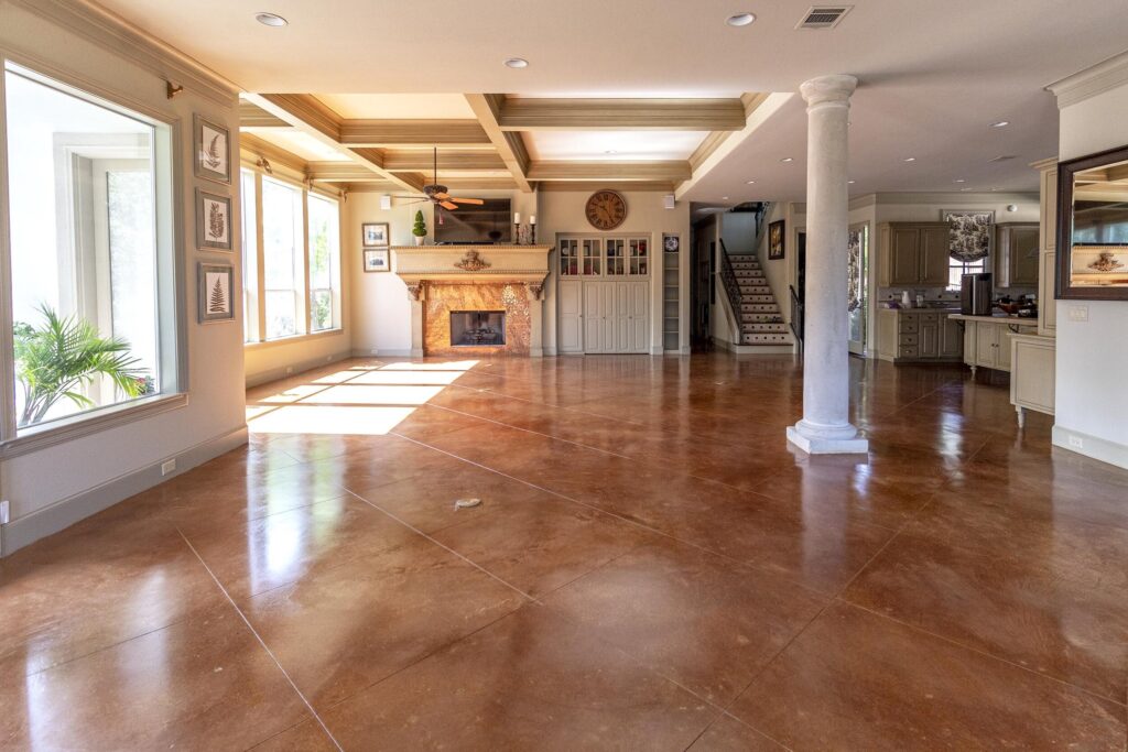 A cola acid stained Craftsman Concrete Floor. This variety of concrete stain offer natural colors with a marbled look.