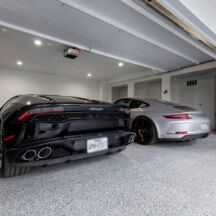 Epoxy flake garage floor with Lamborghini and Porsche