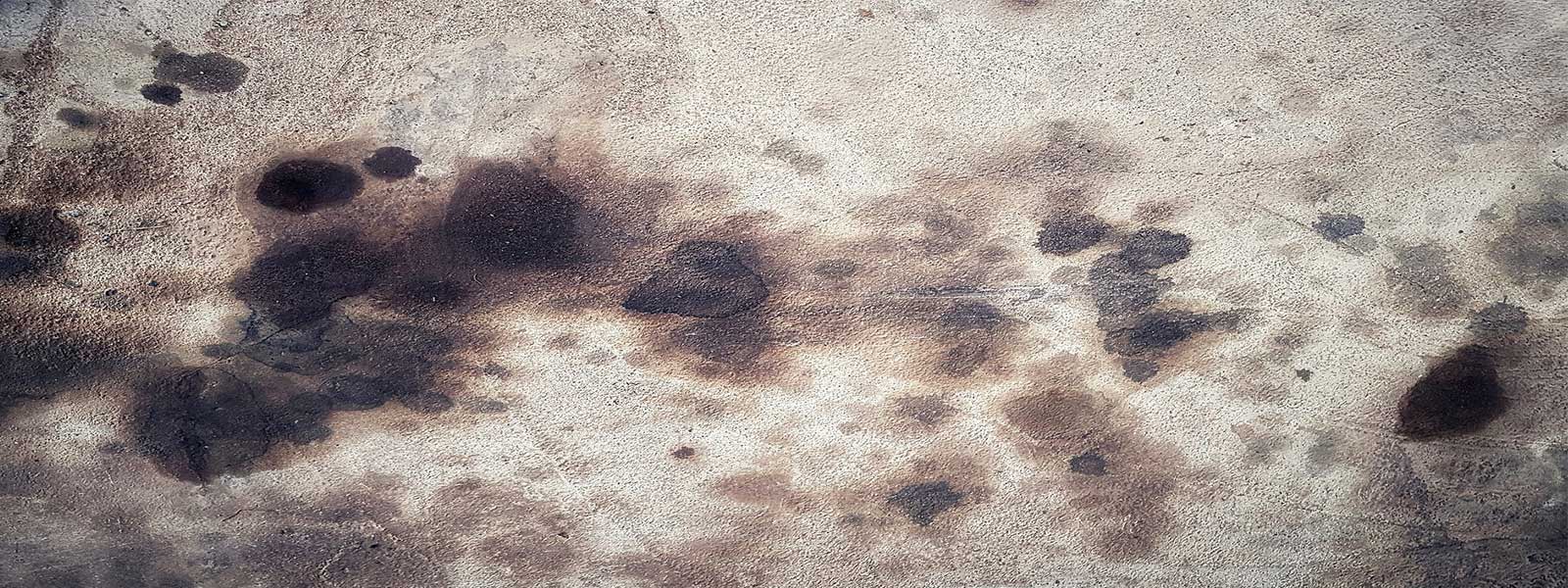 How to Remove Oil Stains From Concrete Floors